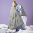 The Meringue Comforter in Sage Green, held open