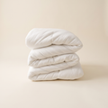 The Meringue Comforter folded, showing the double-stuffed loft